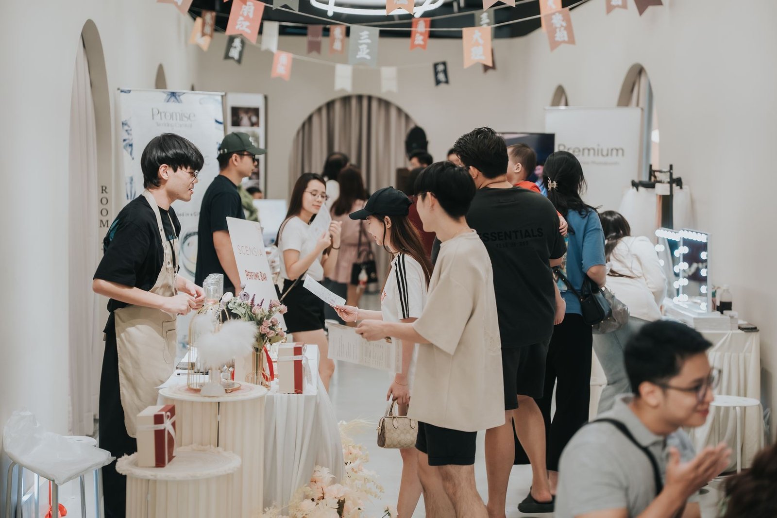 Wedding fair guests browsing exhibitor booths